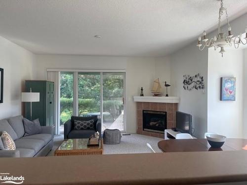 684 Johnston Park Avenue, Collingwood, ON - Indoor Photo Showing Living Room With Fireplace