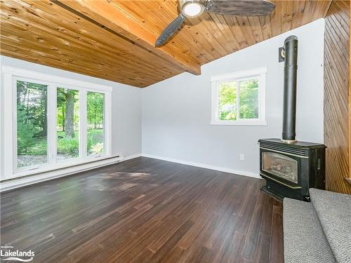 125 Oakwood Drive, Gravenhurst, ON - Indoor Photo Showing Other Room With Fireplace