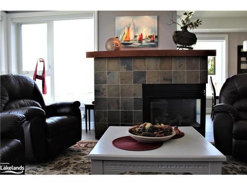 481 Mariners Way, Collingwood, ON - Indoor Photo Showing Living Room With Fireplace