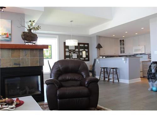 481 Mariners Way, Collingwood, ON - Indoor Photo Showing Living Room With Fireplace