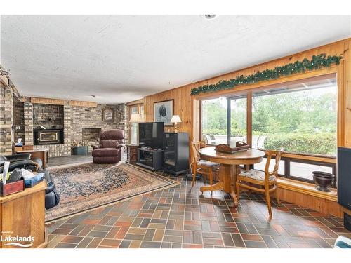 652 North Waseosa Lake Road, Huntsville, ON - Indoor Photo Showing Other Room With Fireplace