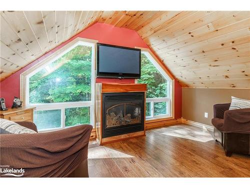 195 Charlies Lane, Huntsville, ON - Indoor Photo Showing Other Room With Fireplace