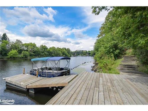 401-31 Dairy Lane, Huntsville, ON - Outdoor With Body Of Water With Deck Patio Veranda With View