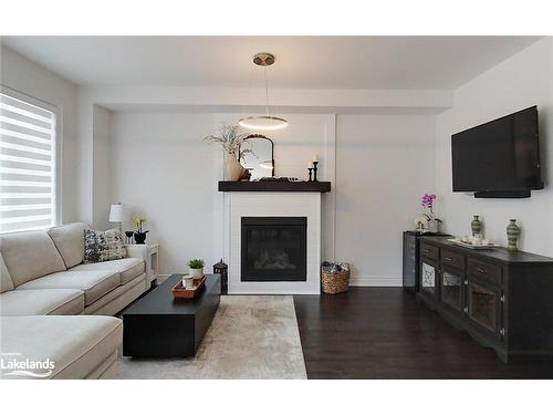 30 Autumn Drive, Wasaga Beach, ON - Indoor Photo Showing Living Room With Fireplace