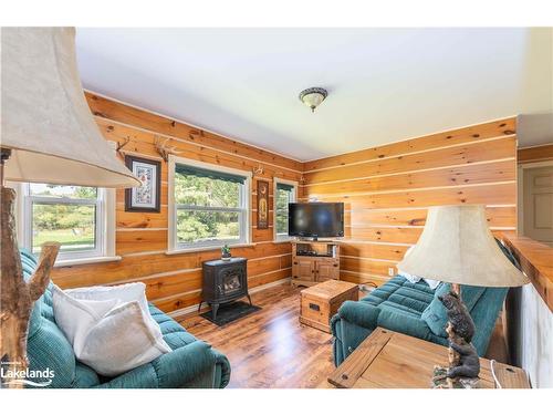 214 North Lancelot Road, Huntsville, ON - Indoor Photo Showing Living Room With Fireplace