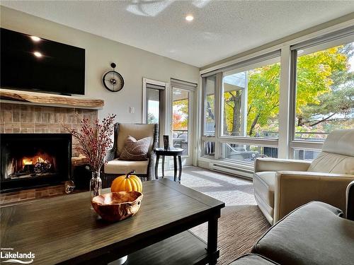 1011 Grandview Hilltop Drive, Huntsville, ON - Indoor Photo Showing Living Room With Fireplace