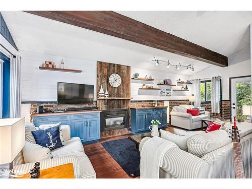 145 St Moritz Crescent, The Blue Mountains, ON - Indoor Photo Showing Living Room With Fireplace