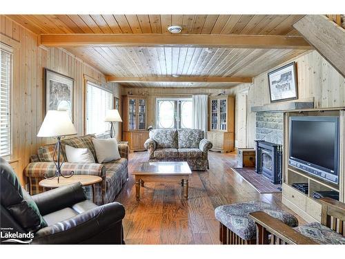 1159 Island Park Rd, Port Carling, ON - Indoor Photo Showing Living Room With Fireplace