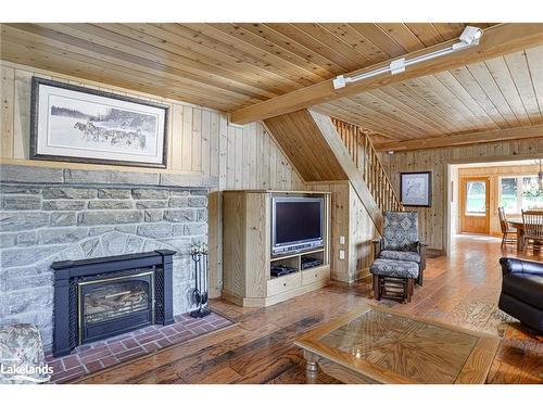 1159 Island Park Rd, Port Carling, ON - Indoor Photo Showing Living Room With Fireplace