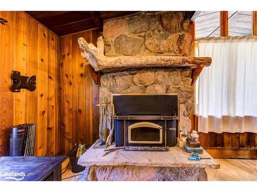 76 29Th Street N, Wasaga Beach, ON - Indoor Photo Showing Other Room With Fireplace