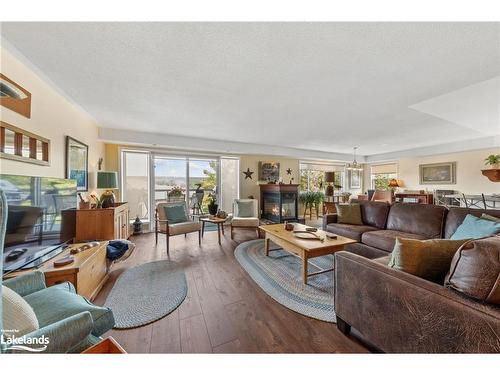 307-4 Beck Boulevard, Penetanguishene, ON - Indoor Photo Showing Living Room With Fireplace