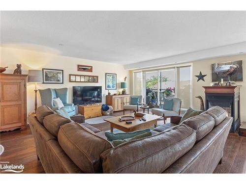 307-4 Beck Boulevard, Penetanguishene, ON - Indoor Photo Showing Living Room With Fireplace