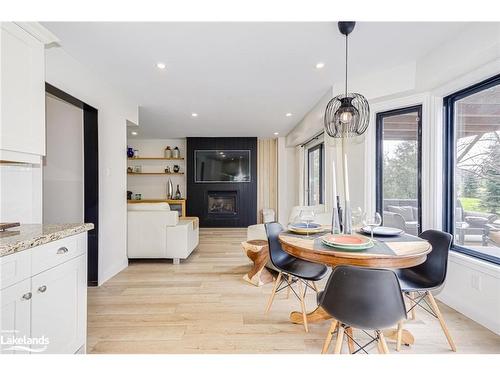 16 Trails End, Collingwood, ON - Indoor Photo Showing Dining Room With Fireplace