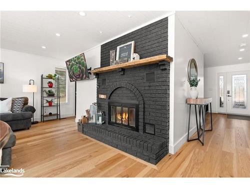 1125 Maplehurst Drive, Huntsville, ON - Indoor Photo Showing Living Room With Fireplace