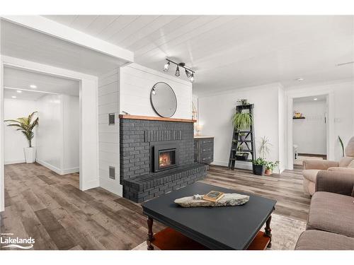 1125 Maplehurst Drive, Huntsville, ON - Indoor Photo Showing Living Room With Fireplace