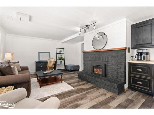 1125 Maplehurst Drive, Huntsville, ON - Indoor Photo Showing Living Room With Fireplace