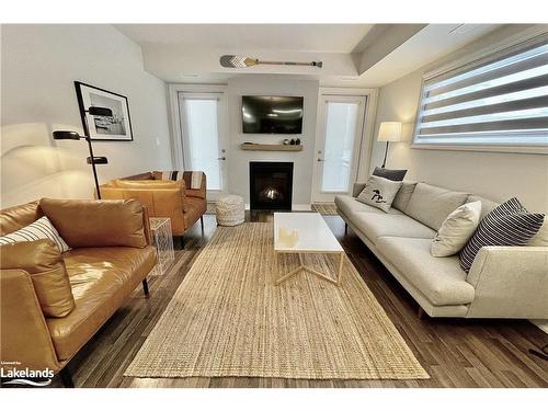 108-2 Cove Court, Collingwood, ON - Indoor Photo Showing Living Room With Fireplace