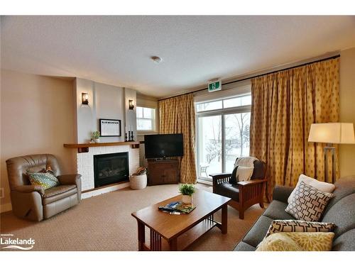 117-125 Fairway Court, Town Of Blue Mountains, ON - Indoor Photo Showing Living Room With Fireplace