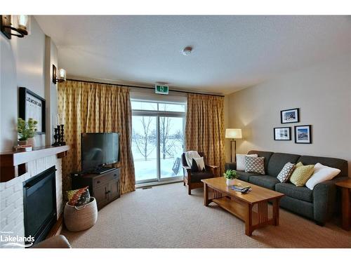 117-125 Fairway Court, Town Of Blue Mountains, ON - Indoor Photo Showing Living Room With Fireplace