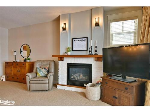 117-125 Fairway Court, Town Of Blue Mountains, ON - Indoor Photo Showing Living Room With Fireplace