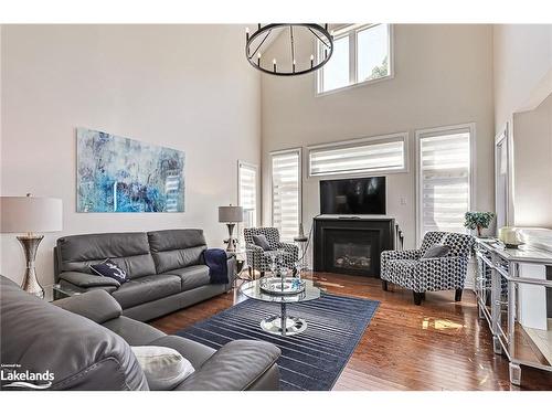 4 Clubhouse Drive, Collingwood, ON - Indoor Photo Showing Living Room With Fireplace