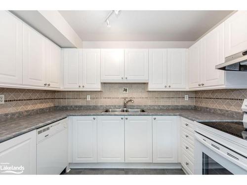 205-4 Beck Boulevard, Penetanguishene, ON - Indoor Photo Showing Kitchen With Double Sink