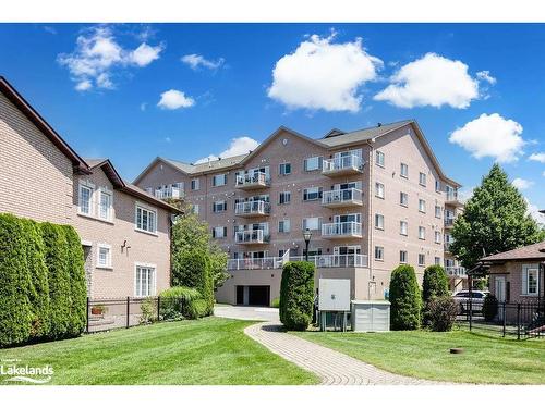 205-4 Beck Boulevard, Penetanguishene, ON - Outdoor With Balcony With Facade