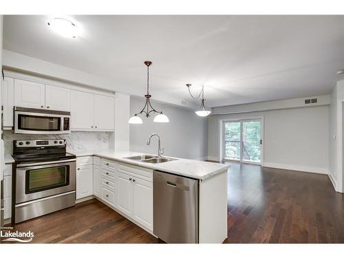 104-391 James Street W, Gravenhurst, ON - Indoor Photo Showing Kitchen With Double Sink