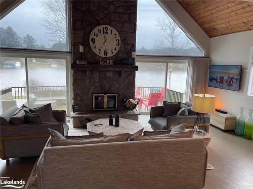 26 Harris Street, Port Carling, ON - Indoor Photo Showing Living Room With Fireplace