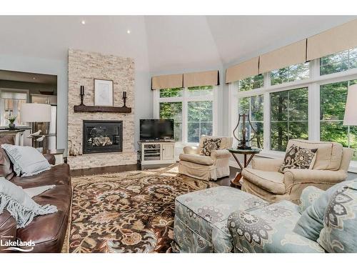 8 St Andrews Circle, Huntsville, ON - Indoor Photo Showing Living Room With Fireplace