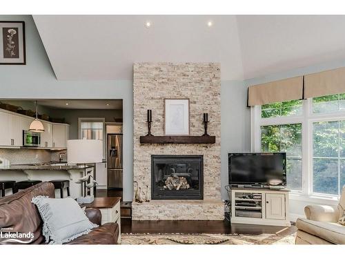 8 St Andrews Circle, Huntsville, ON - Indoor Photo Showing Living Room With Fireplace