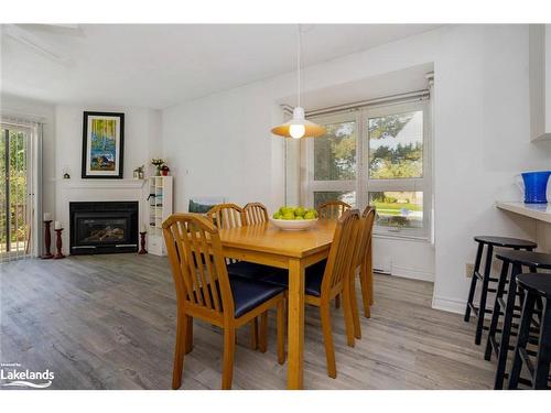 37-55 Louisa Street W, Thornbury, ON - Indoor Photo Showing Dining Room With Fireplace