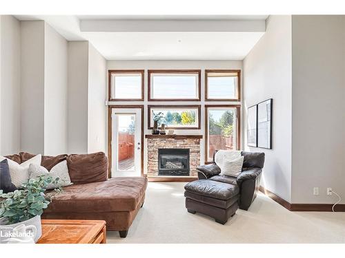 18-104 Farm Gate Road, The Blue Mountains, ON - Indoor Photo Showing Living Room With Fireplace