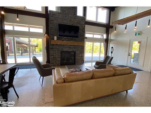 202-12 Beausoleil Lane, The Blue Mountains, ON - Indoor Photo Showing Living Room With Fireplace