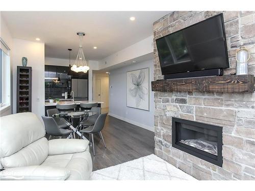 402-16 Beckwith Lane, The Blue Mountains, ON - Indoor Photo Showing Living Room With Fireplace