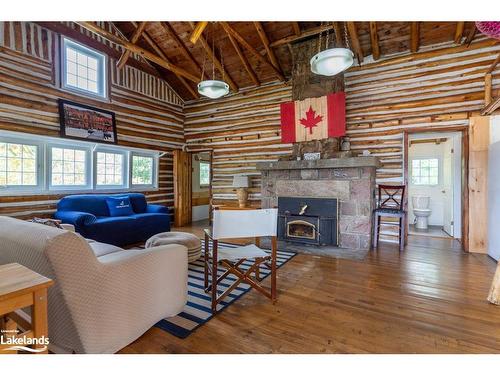 2 Island 860, Honey Harbour, ON - Indoor Photo Showing Living Room With Fireplace