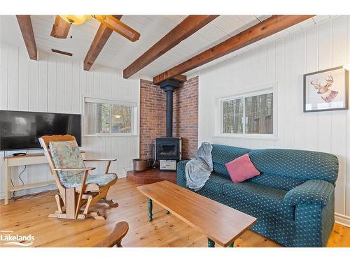 1042 El-Kee Point Lane, Port Carling, ON - Indoor Photo Showing Living Room With Fireplace