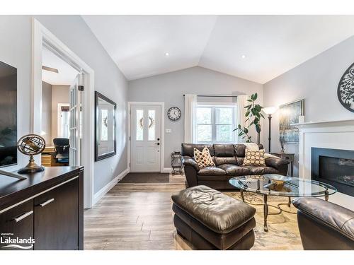 6 Lake Drive, Huntsville, ON - Indoor Photo Showing Living Room With Fireplace