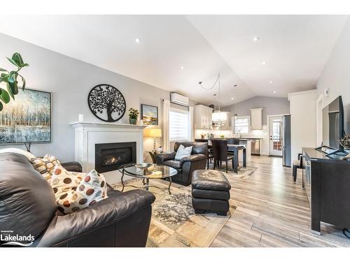 6 Lake Drive, Huntsville, ON - Indoor Photo Showing Living Room With Fireplace