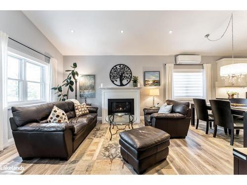 6 Lake Drive, Huntsville, ON - Indoor Photo Showing Living Room With Fireplace