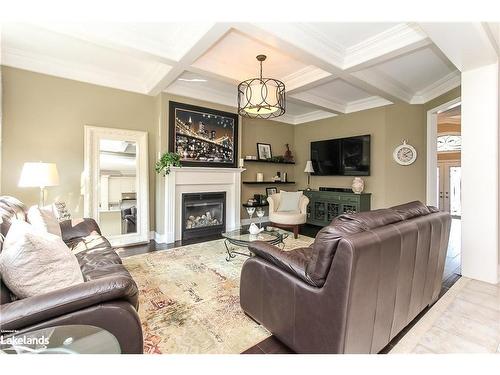 16 Basswood Drive, Wasaga Beach, ON - Indoor Photo Showing Living Room With Fireplace