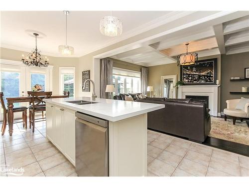 16 Basswood Drive, Wasaga Beach, ON - Indoor Photo Showing Kitchen With Fireplace With Double Sink