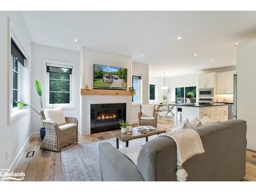 6 Boulder Court, Huntsville, ON - Indoor Photo Showing Living Room With Fireplace