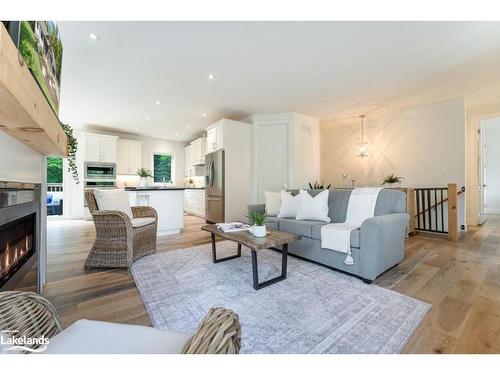 6 Boulder Court, Huntsville, ON - Indoor Photo Showing Living Room With Fireplace