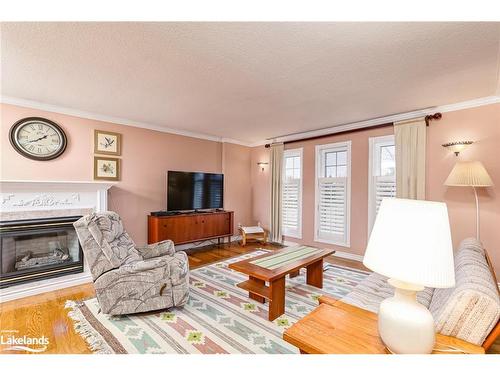 38 Mckean Boulevard, Nottawa, ON - Indoor Photo Showing Living Room With Fireplace