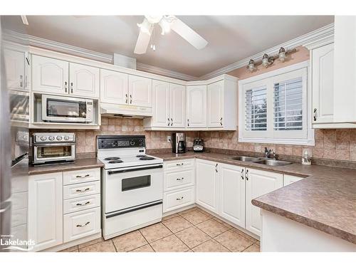 38 Mckean Boulevard, Nottawa, ON - Indoor Photo Showing Kitchen With Double Sink