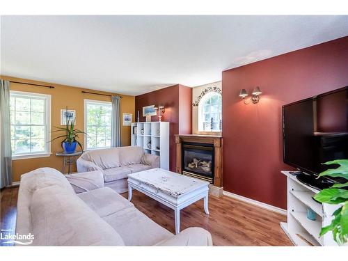 7 Andrew Court, Wasaga Beach, ON - Indoor Photo Showing Living Room With Fireplace