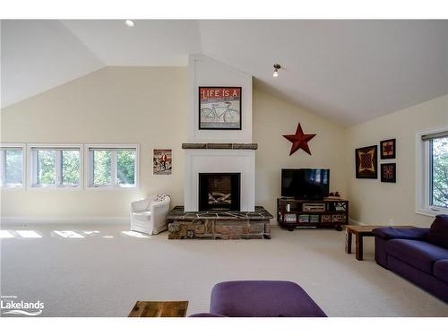 230 Ecclestone Drive, Bracebridge, ON - Indoor Photo Showing Living Room With Fireplace