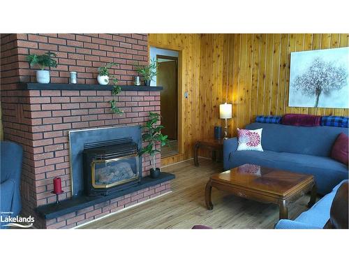 69 Albert Avenue, Tiny, ON - Indoor Photo Showing Living Room With Fireplace