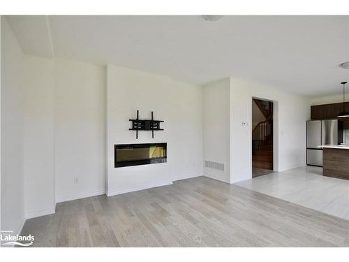 32 Simona Avenue, Wasaga Beach, ON - Indoor Photo Showing Other Room With Fireplace